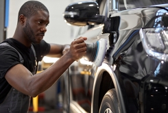 Abrasion resistant oligomers, man buffering the front of a vehicle