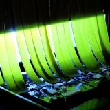 Fast Light-Curing Oligomers, PCB Board Being Fed Through a Conveyor